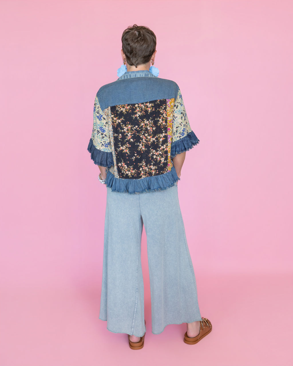 Distressed Denim Crop Jacket with Ruffled Hem