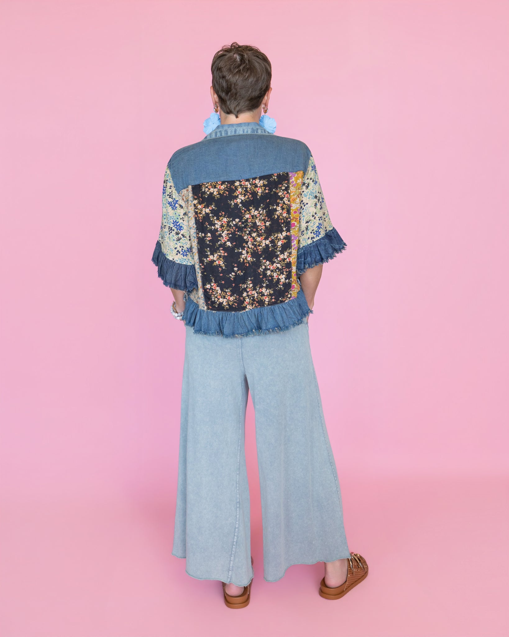 Distressed Denim Crop Jacket with Ruffled Hem