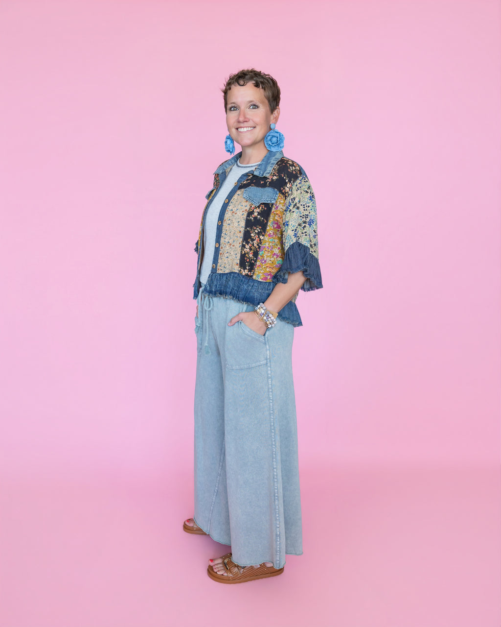 Distressed Denim Crop Jacket with Ruffled Hem