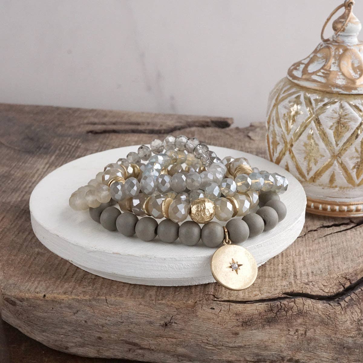 Beaded bracelets set in Gray with a coin charm