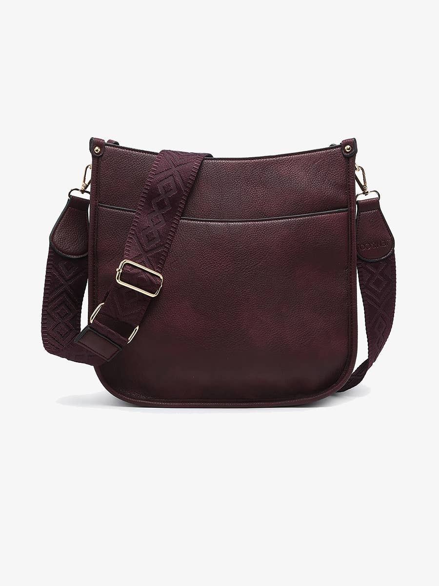 Stylish long shoulder bag with adjustable straps and multiple compartments.