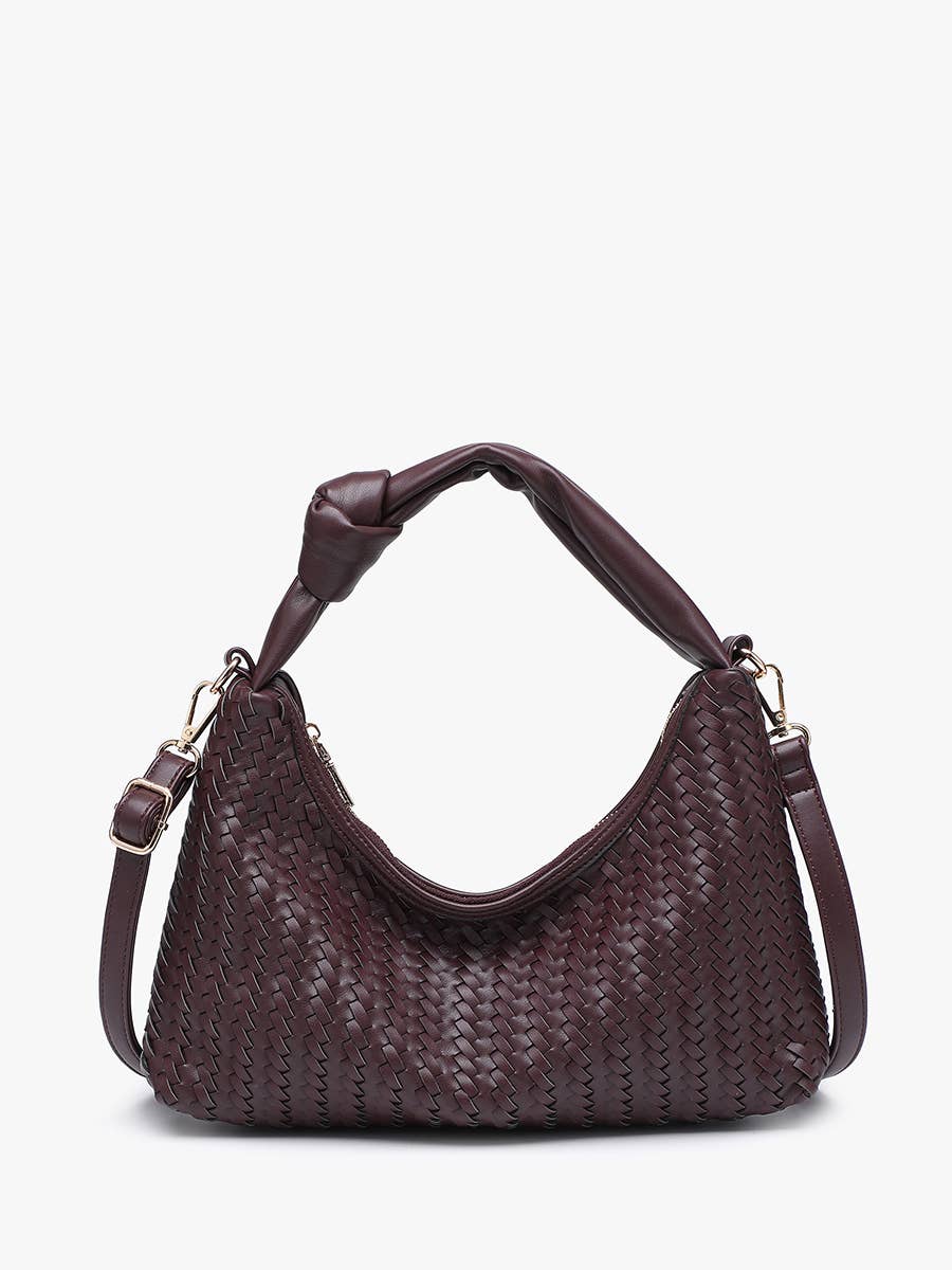 A stylish handwoven convertible bag with adjustable ventilation and zip closure.