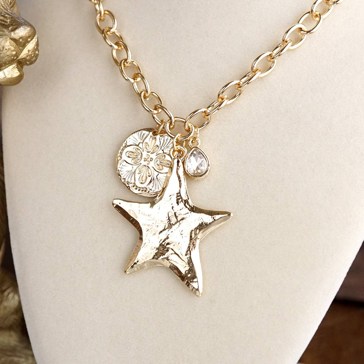 Golden Keepsake – Mixed Charm Star Necklace