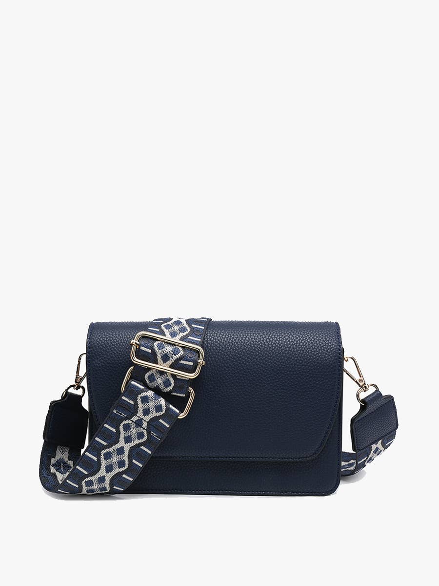 A stylish and versatile vegan leather bag with adjustable straps and multiple compartments.