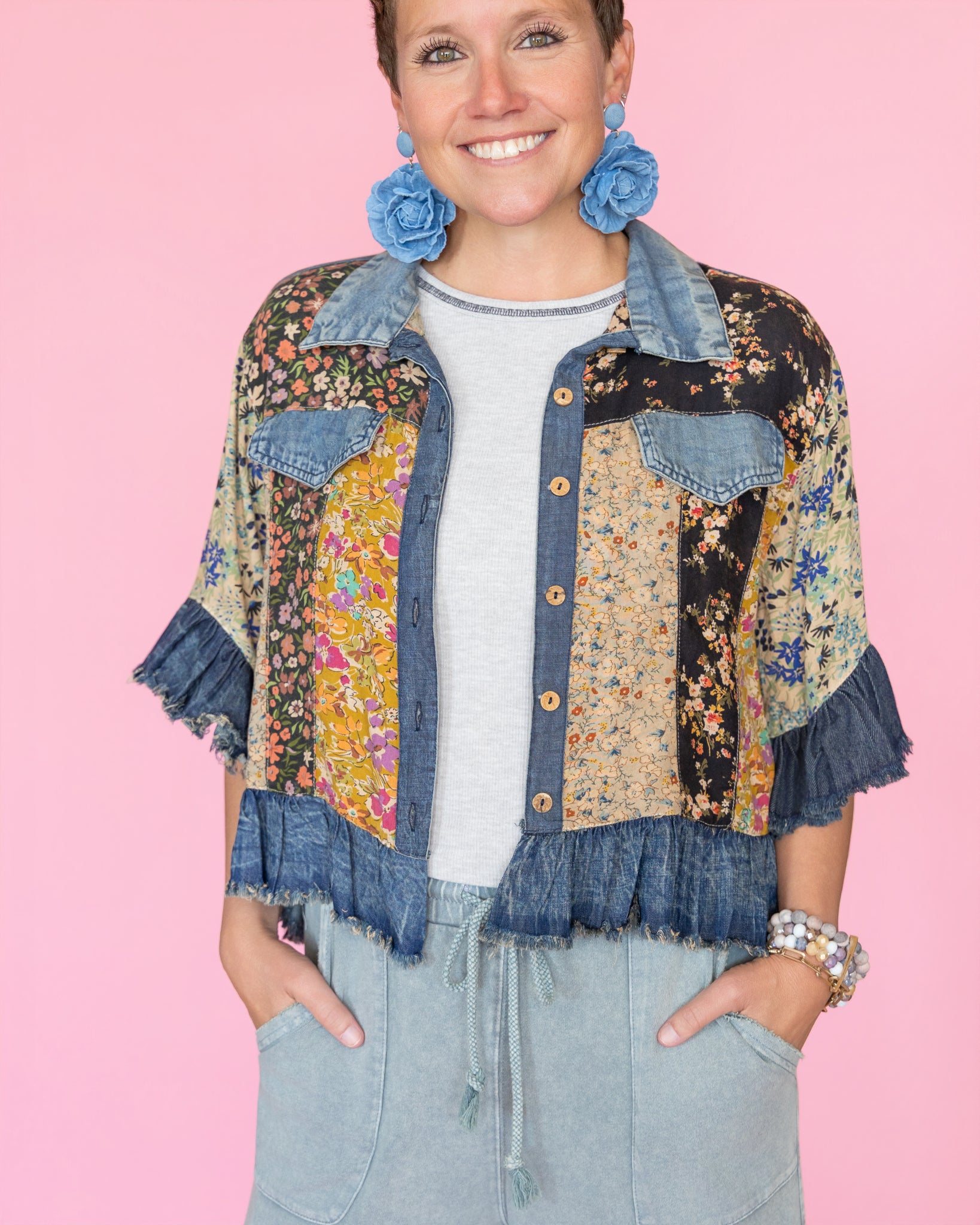 Distressed Denim Crop Jacket with Ruffled Hem