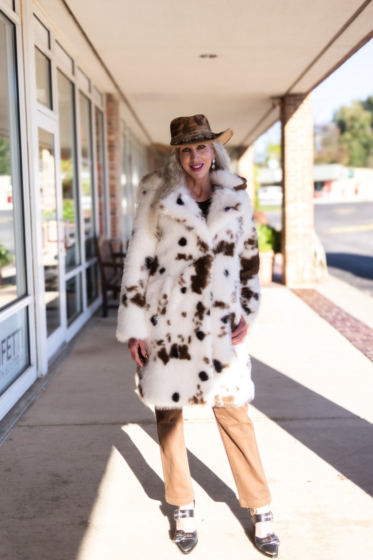 Sierra Cow Print Faux Fur Coat