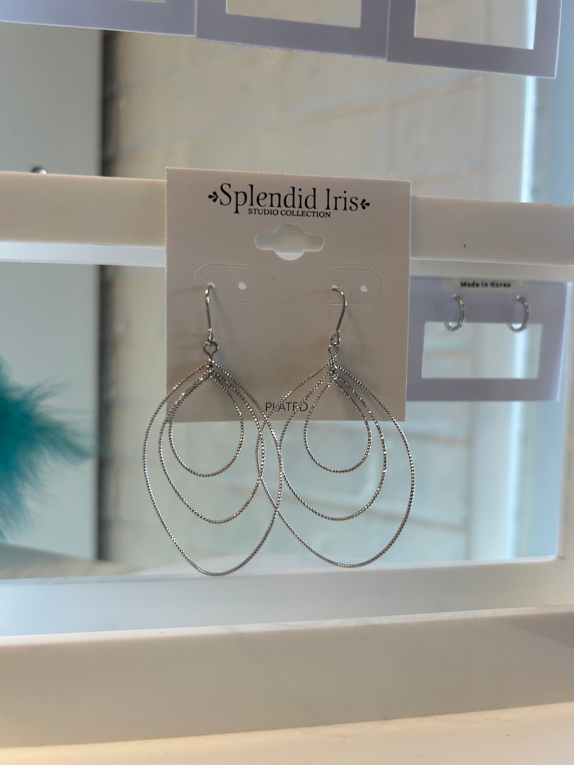 Splendid Iris Twisted Dangle Earring