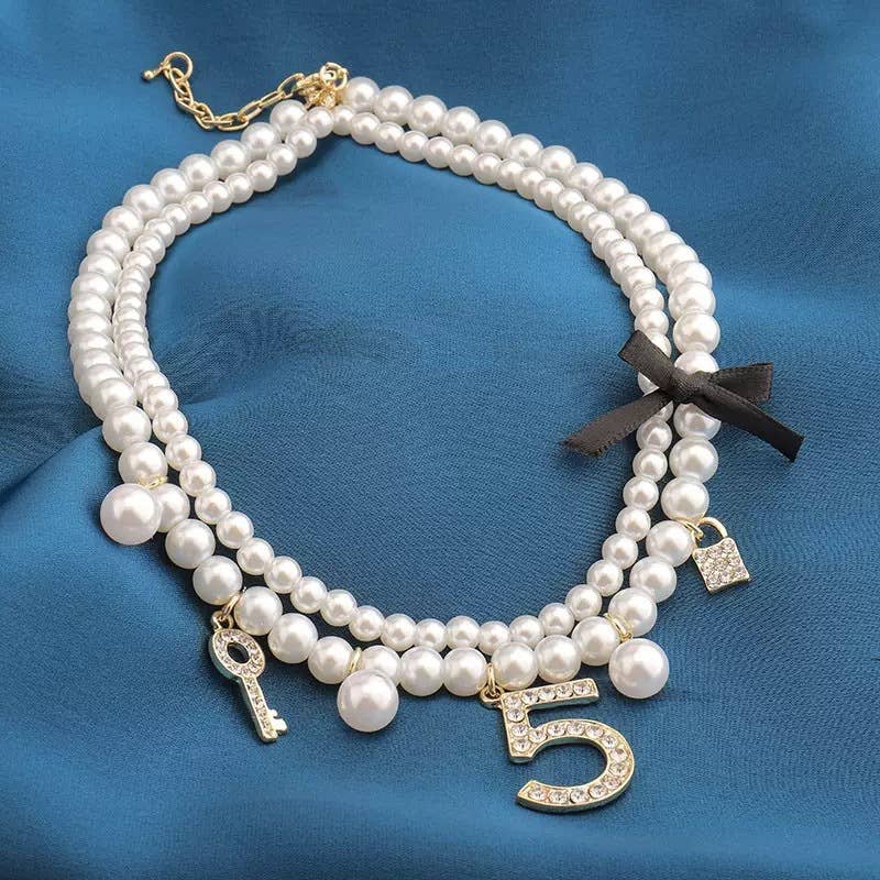 Pearlies Necklace with Symbolic Charms in Ivory